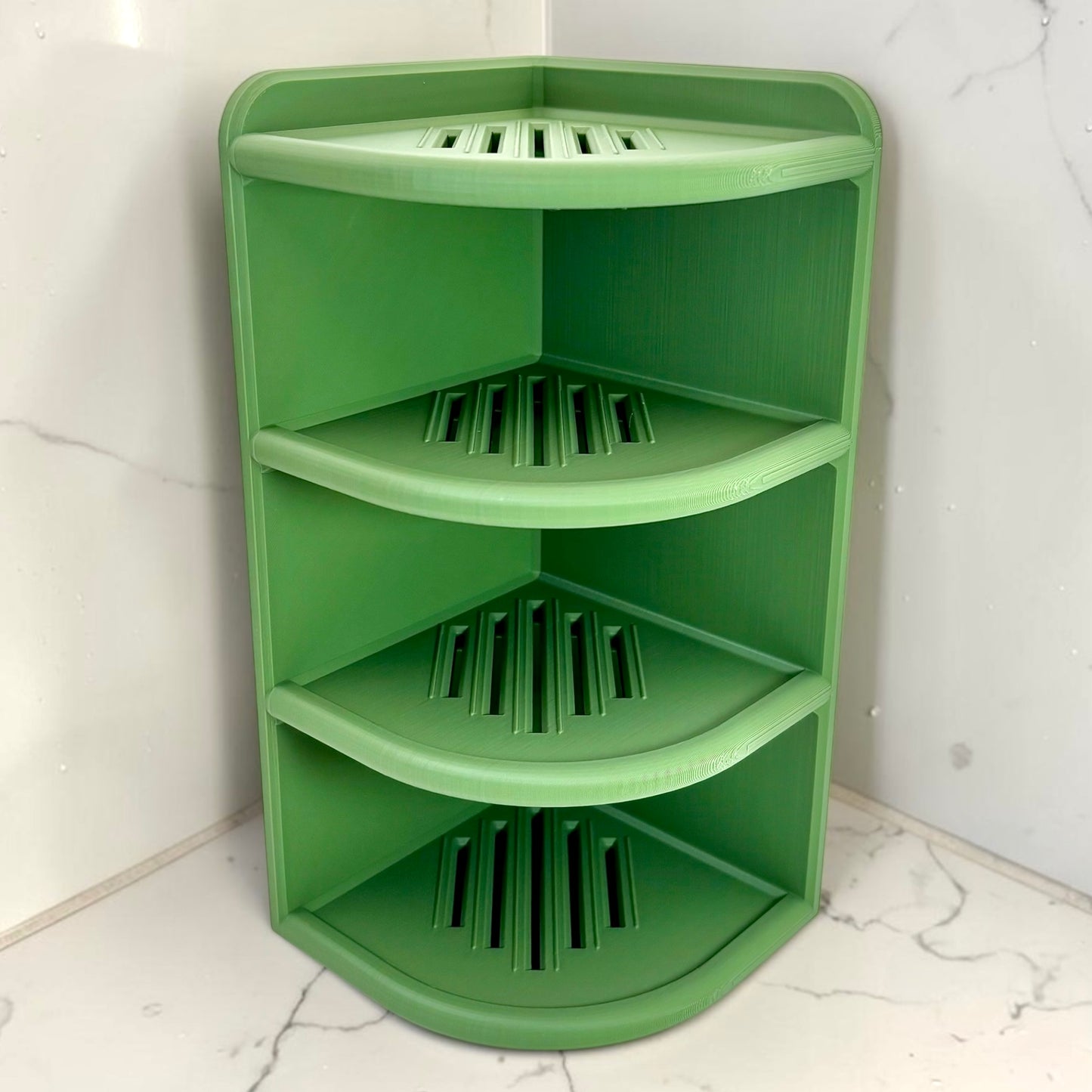 Green corner shelf against a white marble wall