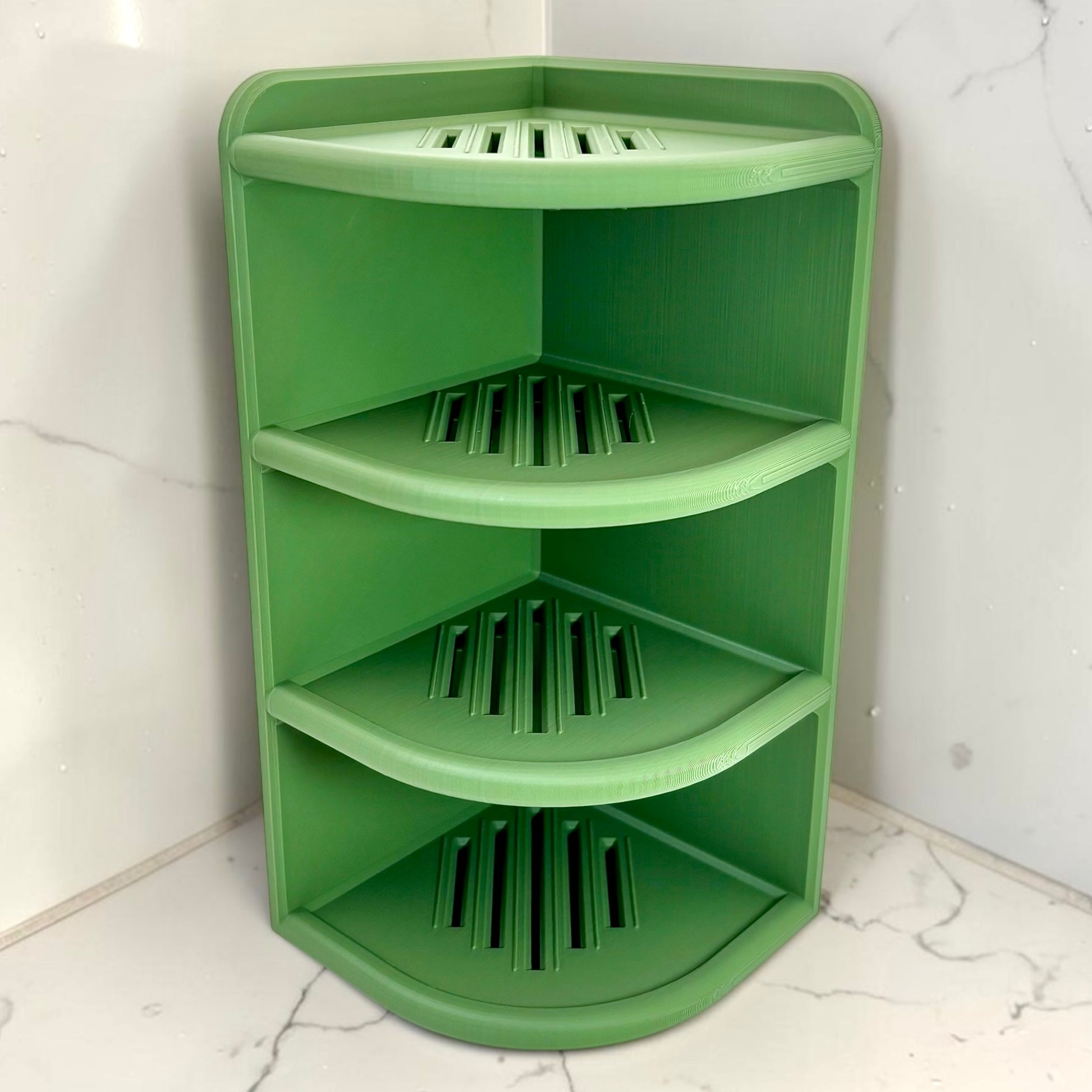 Green corner shelf against a white marble wall