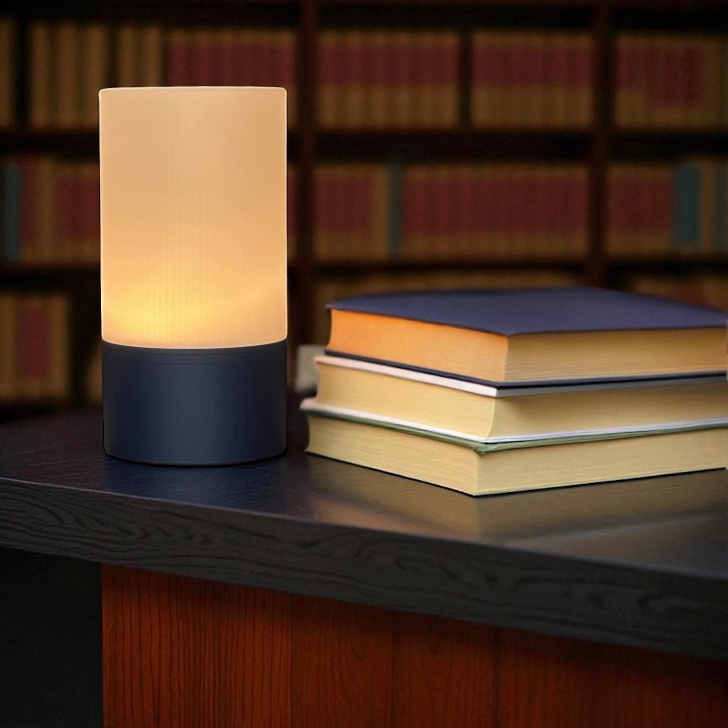 Table lamp on a surface with books in the background