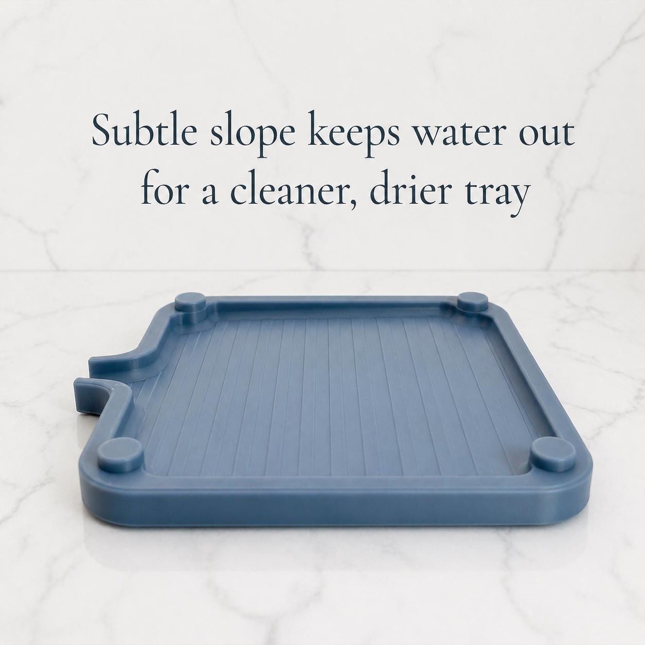 Blue plastic tray with a subtle slope on a white background